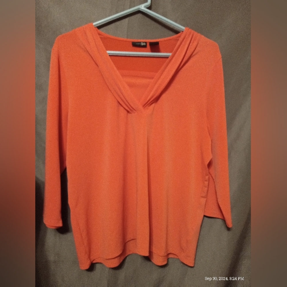 East 5th orange slinky blouse